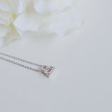 Libra Zodiac Symbol Necklace.